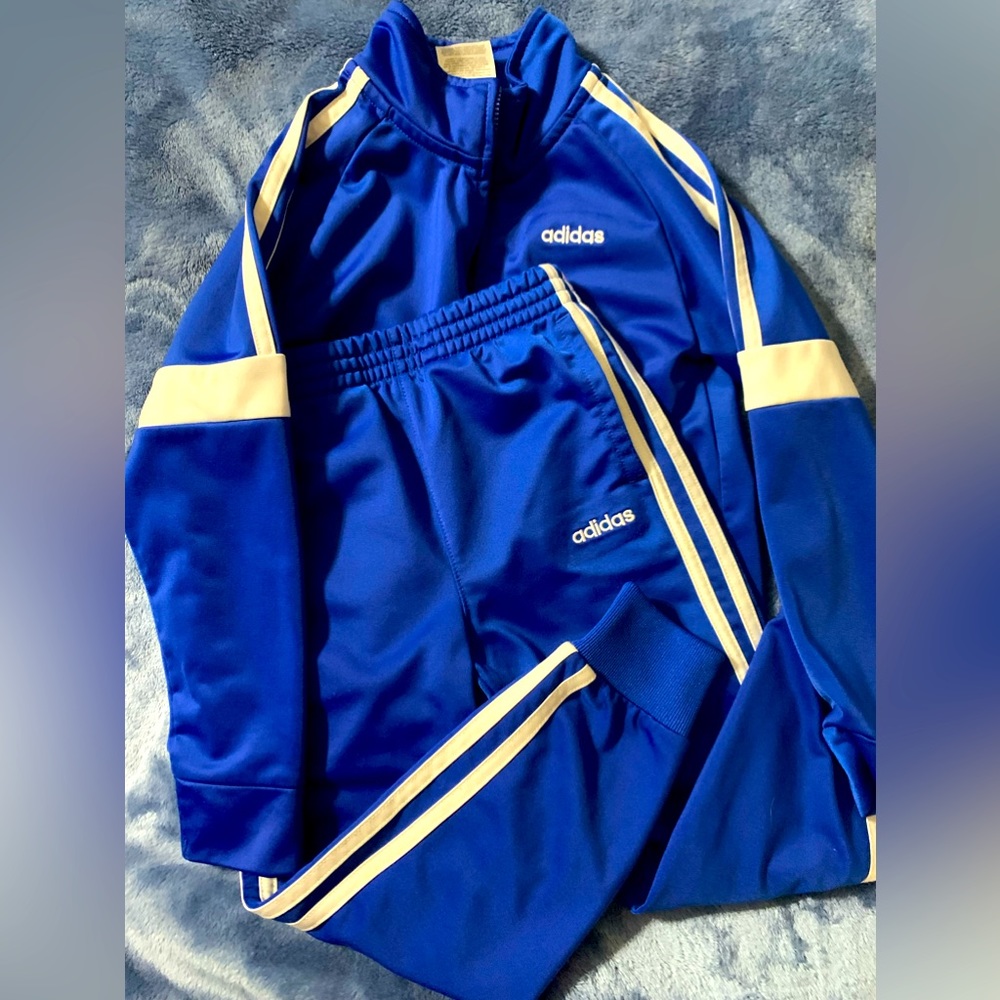 Blue adidas track suit